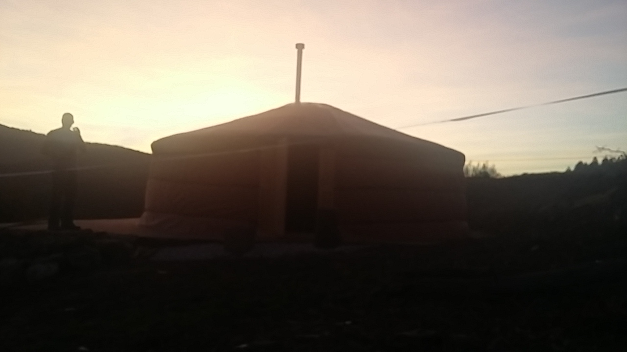 Olabe yurt at sunset Sun setting on Olabe yurt