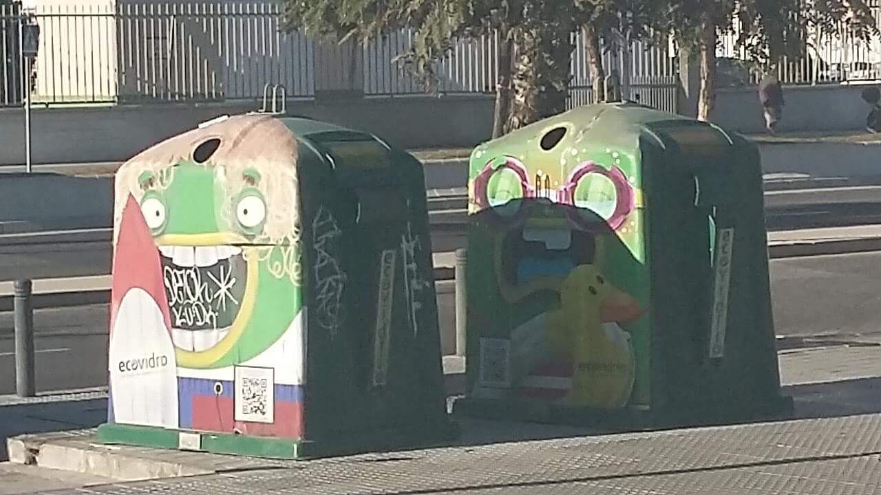 Graffitied bins Malaga characters Council sanctioned graffiti colourful themes