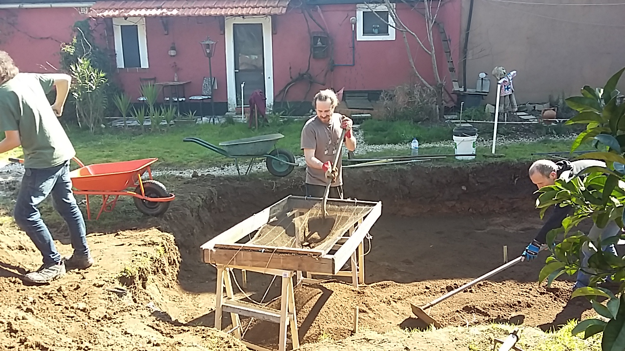 Helpers workaway sunshine Portugal shovelling earth